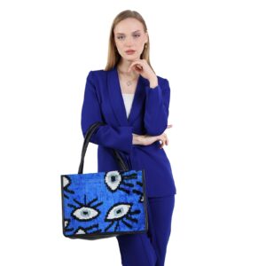 Ebony Blue Eye Pattern Women Medium Tote Bag