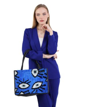 Ebony Blue Eye Pattern Women Medium Tote Bag